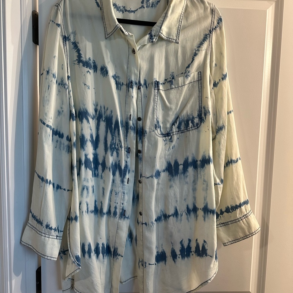 This is a " beautiful soul" now arula shirt that has never been worn.